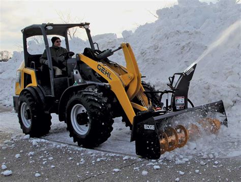 mini x snow removal